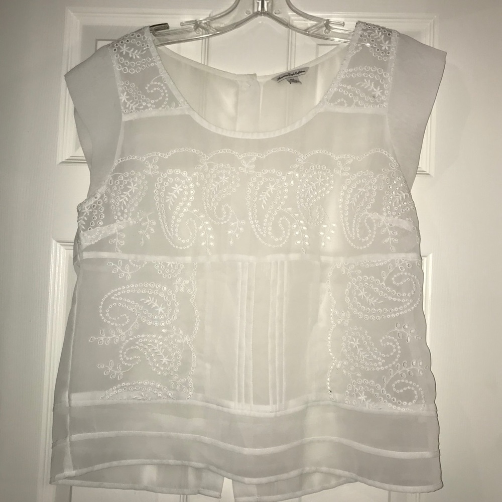 Sheer white cap sleeve blouse